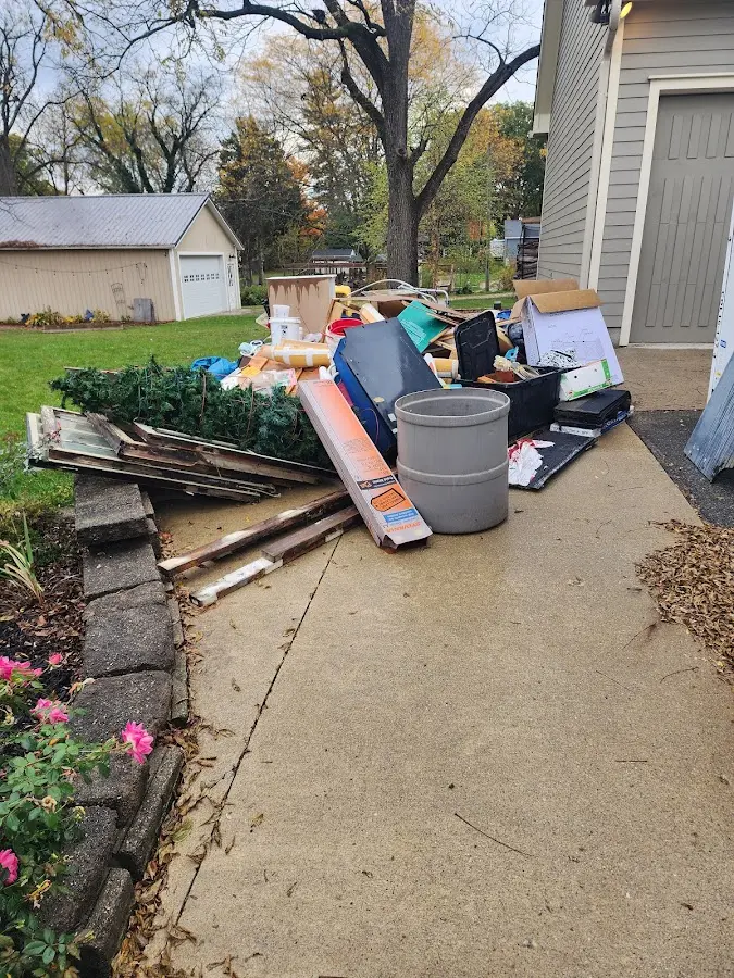 Dumpster being loaded with debris for Commercial Dumpster Rental in Vancleave